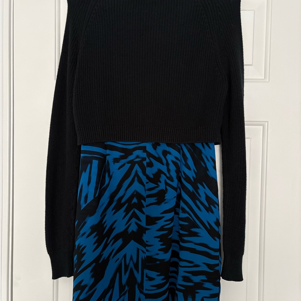 Black Cropped Embellished Sweater Over Blue & Black Patterned Dress
